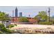Brick building with rooftop and cityscape, including prominent architecture at 24 Daniel Se St # 3, Atlanta, GA 30312