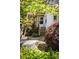 Charming front entrance with stone walkway and stairs leading to the front door at 24 Daniel Se St # 3, Atlanta, GA 30312