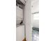 Convenient laundry area with stackable washer and dryer, leading to bathroom at 24 Daniel Se St # 3, Atlanta, GA 30312