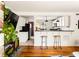 Living room showcasing open layout, hardwood floors, and access to a modern kitchen at 24 Daniel Se St # 3, Atlanta, GA 30312