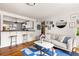 Bright living room with stylish decor, hardwood floors, and open access to the kitchen at 24 Daniel Se St # 3, Atlanta, GA 30312