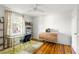 Bright office space with hardwood floors, modern furniture, and window at 24 Daniel Se St # 3, Atlanta, GA 30312