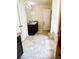 Spacious bathroom with a vanity, a toilet, and a tub/shower combo, offering functionality at 573 Emporia Loop, Mcdonough, GA 30253