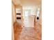 Upstairs hallway leading to bedrooms with carpeted flooring at 573 Emporia Loop, Mcdonough, GA 30253