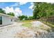Large backyard featuring a gravel area and wooden fencing at 7307 Banks Mill Rd, Douglasville, GA 30135