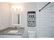Stylish bathroom featuring granite countertop, modern vanity, and subway tile shower surround at 7307 Banks Mill Rd, Douglasville, GA 30135
