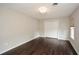 Spacious bedroom featuring hardwood floors, double door closet and plenty of room to relax at 7307 Banks Mill Rd, Douglasville, GA 30135