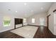 Huge primary bedroom offering a lot of space and a door leading to the backyard at 7307 Banks Mill Rd, Douglasville, GA 30135