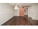 Dining area featuring a barn door entrance and a decorative light fixture at 7307 Banks Mill Rd, Douglasville, GA 30135
