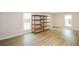 Bright storage room with shelves, neutral paint, and large windows offering natural light at 7307 Banks Mill Rd, Douglasville, GA 30135