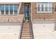 Charming brick townhome with a private entrance, featuring a welcoming stairway at 1382 Doublegate Ne Dr, Atlanta, GA 30319