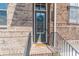 Elegant front entrance with brick steps, leading to a welcoming door with wreath at 1382 Doublegate Ne Dr, Atlanta, GA 30319