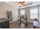 Comfortable office space with a modern desk, chair, and hardwood floors at 1382 Doublegate Ne Dr, Atlanta, GA 30319