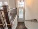 Elegant wooden staircase with dark wood flooring, leading to the main living area at 1382 Doublegate Ne Dr, Atlanta, GA 30319