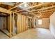 Unfinished basement space featuring exposed beams and ductwork, presenting a blank canvas for customization at 1533 Fallen Leaf Sw Dr, Marietta, GA 30064