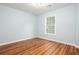 Bright bedroom featuring hardwood floors and a window providing natural light at 1533 Fallen Leaf Sw Dr, Marietta, GA 30064
