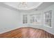 Bedroom featuring hardwood floors, a trey ceiling, and natural lighting at 1533 Fallen Leaf Sw Dr, Marietta, GA 30064
