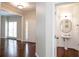 Bright foyer with hardwood floors and half bath access in an open layout at 1533 Fallen Leaf Sw Dr, Marietta, GA 30064