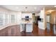Eat-in kitchen featuring a granite island, stainless steel appliances, and ample counter space at 1533 Fallen Leaf Sw Dr, Marietta, GA 30064