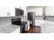 Beautiful kitchen with a granite countertop, stainless steel appliances and subway tile backsplash at 1533 Fallen Leaf Sw Dr, Marietta, GA 30064