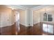 Spacious living room featuring hardwood floors, neutral paint, and abundant natural light at 1533 Fallen Leaf Sw Dr, Marietta, GA 30064