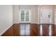 Open-concept living room with hardwood floors, natural light, and a welcoming atmosphere at 1533 Fallen Leaf Sw Dr, Marietta, GA 30064