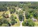 Overhead image shows a property with mature trees and a long driveway leading to the secluded home at 204 Mt Moriah Rd, Auburn, GA 30011