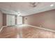 Unfinished basement with hardwood floors and several closets at 204 Mt Moriah Rd, Auburn, GA 30011