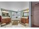 Luxurious primary bathroom with double vanities, a soaking tub, and a separate shower at 204 Mt Moriah Rd, Auburn, GA 30011