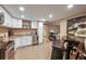Cozy kitchen features stainless steel appliances, granite countertops and white cabinets at 204 Mt Moriah Rd, Auburn, GA 30011