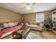 Comfortable living room showcases a decorative ceiling fan and cozy furniture at 204 Mt Moriah Rd, Auburn, GA 30011