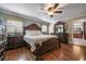 Spacious primary bedroom suite with elegant furnishings and ample natural light at 204 Mt Moriah Rd, Auburn, GA 30011