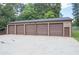 Detached garage features multiple bays and plenty of parking space at 204 Mt Moriah Rd, Auburn, GA 30011