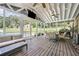 Relaxing screened porch with outdoor seating, wood flooring and pool views at 204 Mt Moriah Rd, Auburn, GA 30011