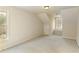 Bright bedroom features neutral walls and carpet, window nook, and built-in storage at 300 Maple Grove Ct, Canton, GA 30114