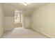 Neutral carpeted bedroom with a dormer window and built-in storage at 300 Maple Grove Ct, Canton, GA 30114