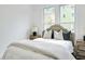 Bright bedroom featuring natural light, neutral colors, and a comfortable bed at 1166 Mcdaniel Sw St, Atlanta, GA 30310