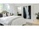 Cozy bedroom with a comfortable bed, ensuite bathroom, and stylish decor at 1166 Mcdaniel Sw St, Atlanta, GA 30310