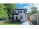Charming two-story home with black trim, covered porch, and a well-maintained lawn at 1166 Mcdaniel Sw St, Atlanta, GA 30310