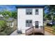 Rear exterior view of a home with a deck, yard, and modern siding at 1166 Mcdaniel Sw St, Atlanta, GA 30310