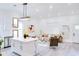 Stylish kitchen with white cabinets, an island, and modern pendant lighting at 1166 Mcdaniel Sw St, Atlanta, GA 30310