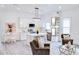 Bright, open-concept living space with modern decor, island seating and lots of natural light at 1166 Mcdaniel Sw St, Atlanta, GA 30310