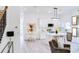 Open concept living space showcasing the kitchen, dining area, and modern decor at 1166 Mcdaniel Sw St, Atlanta, GA 30310