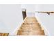 Staircase features wooden treads and a wooden handrail, providing a warm, inviting entrance at 1166 Mcdaniel Sw St, Atlanta, GA 30310