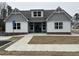 Charming community center with grey and white siding, and stone accents at 3032 Farm Tract Trl, Woodstock, GA 30189