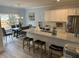 Charming open kitchen with granite countertops and stainless steel appliances at 3032 Farm Tract Trl, Woodstock, GA 30189