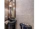 Chic bathroom featuring tiled wall, ornate mirror, vanity with vessel sink, and black toilet at 3167 Blairhill Ct, Atlanta, GA 30340