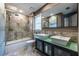 Bathroom with double sinks, walk-in shower and large framed mirror at 3167 Blairhill Ct, Atlanta, GA 30340