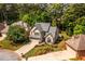 Well-maintained two-story home with manicured landscaping, a circular driveway, and an attached garage at 3167 Blairhill Ct, Atlanta, GA 30340