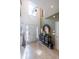 Bright, two-story foyer with tile flooring, designer mirrors, and a charming entryway at 3167 Blairhill Ct, Atlanta, GA 30340